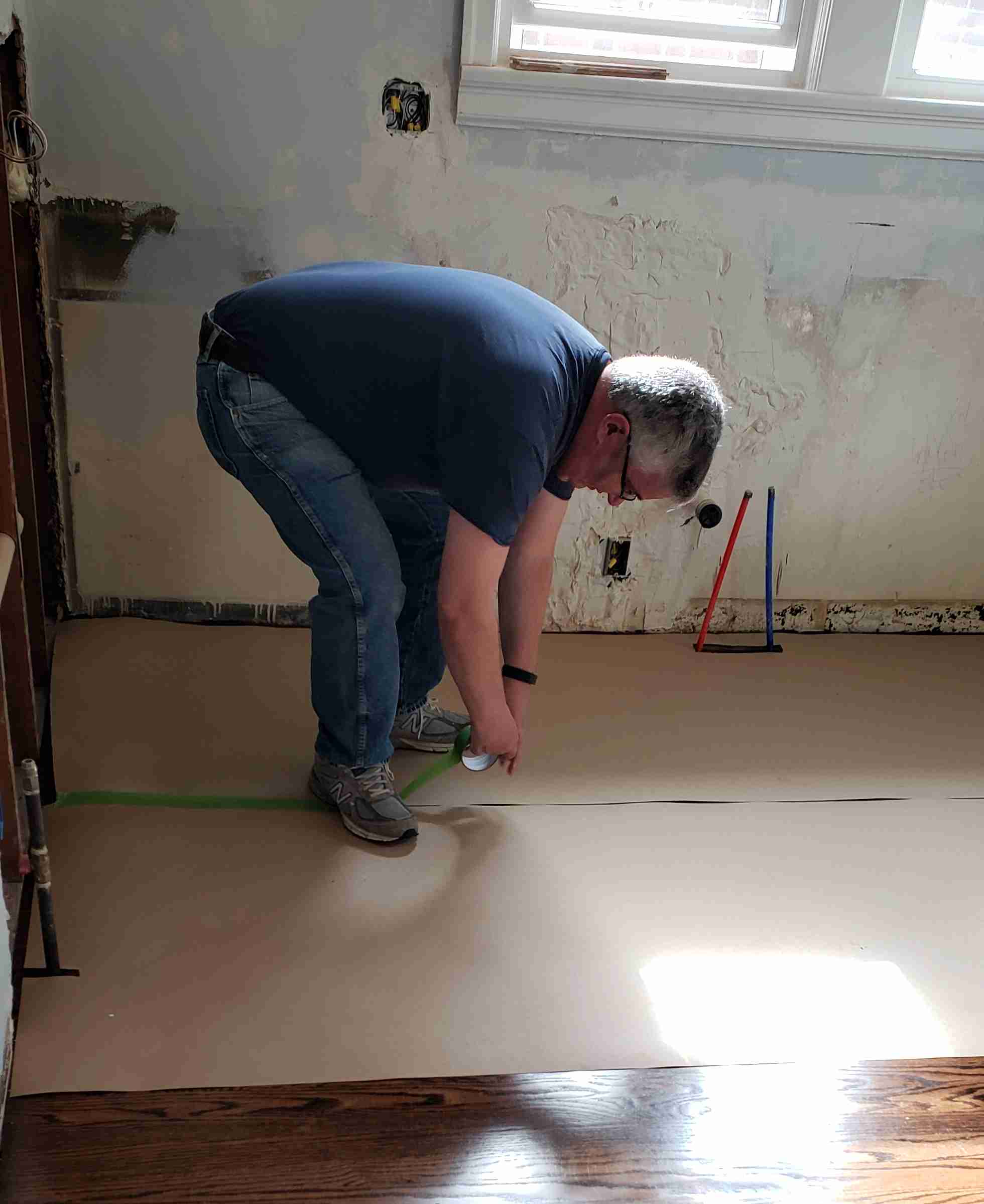 2019-05-15 7320 Goff papering the floors.jpg